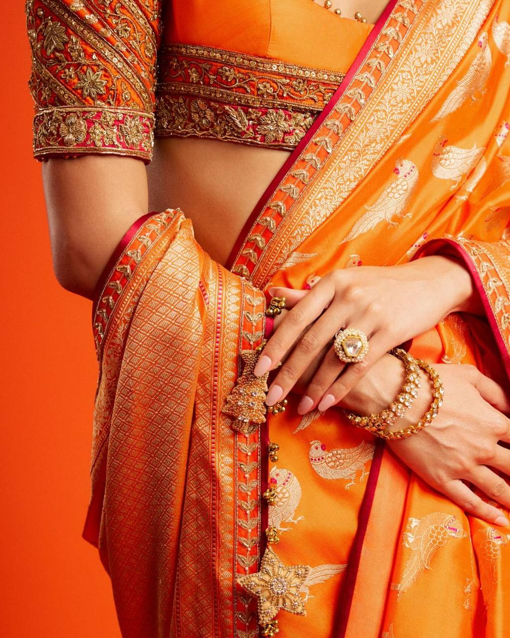 Ananya Panday Inspired Orange Color Perrot Figure Weaving Saree