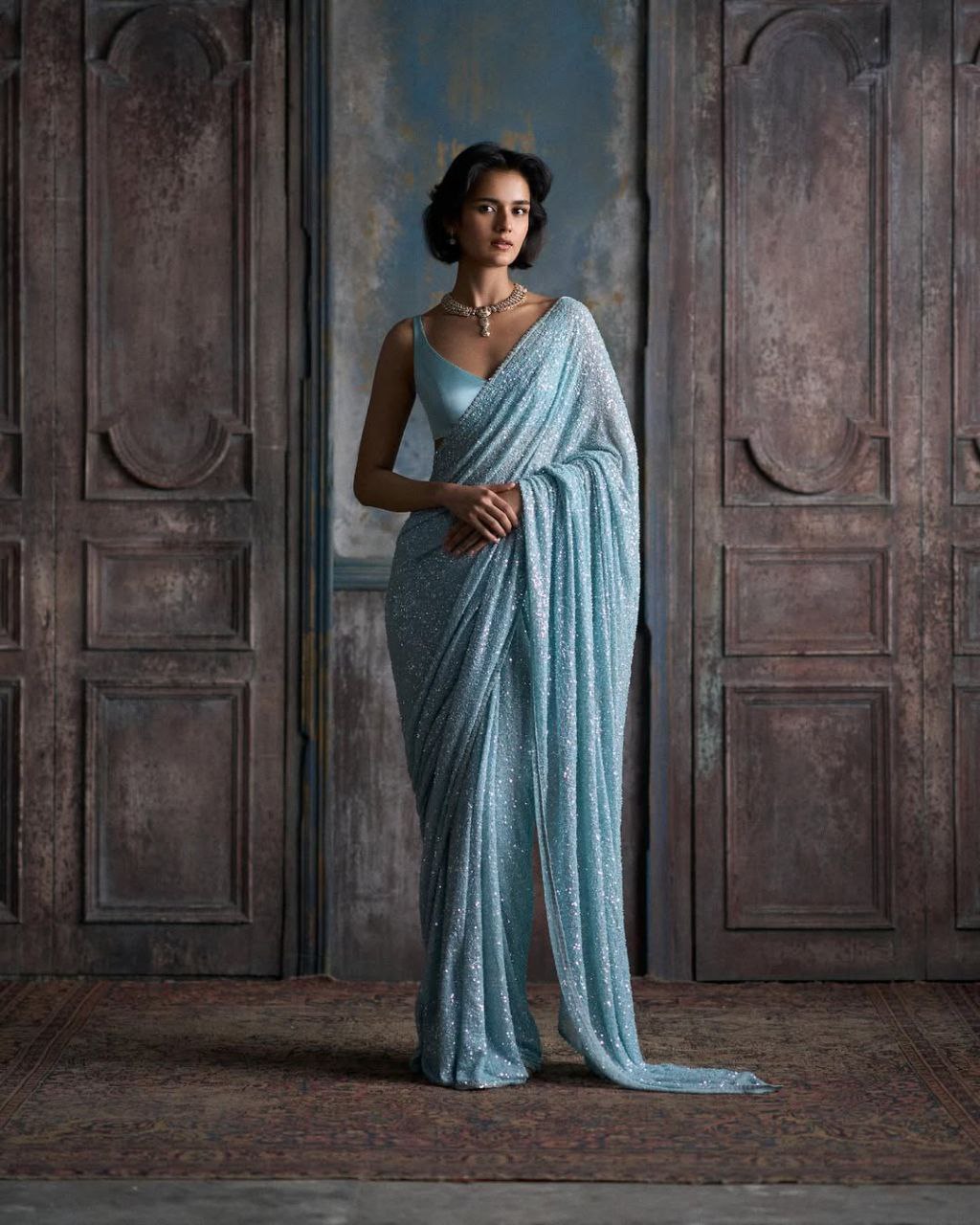 Bollywood Inspired Sky Blue Sequin Saree with Border Detailing