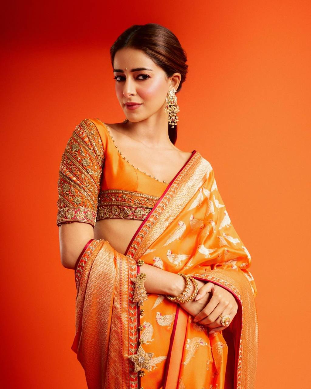 Ananya Panday Inspired Orange Color Perrot Figure Weaving Saree